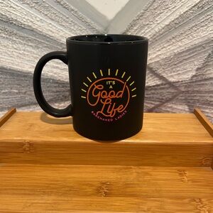 Black 'It's a Good Life' Mug by Bare Naked Ladies